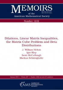 Dilations, Linear Matrix Inequalities, the Matrix Cube Problem and Beta Distributions